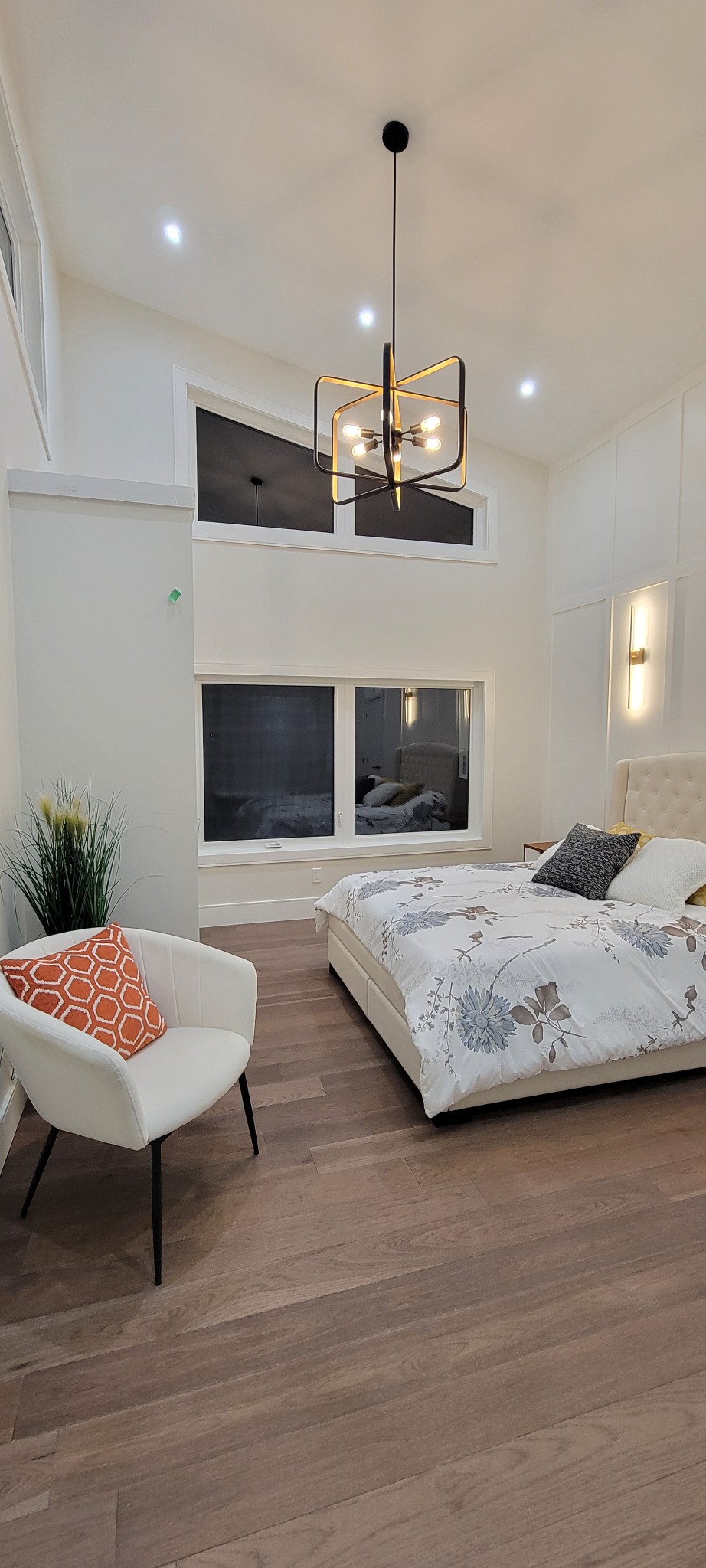 Bright queen bedroom with vaulted ceiling