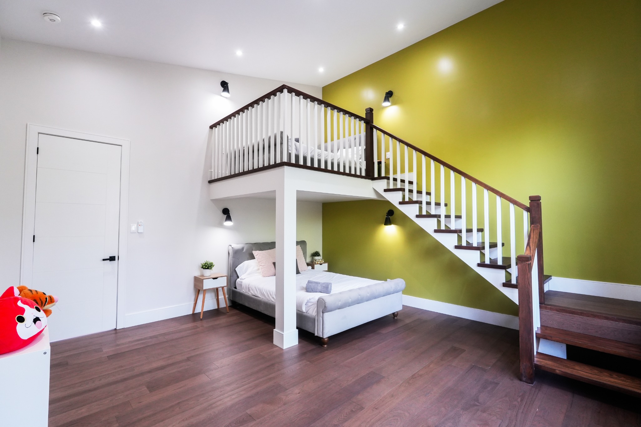 Bedroom with queen bed and private loft above