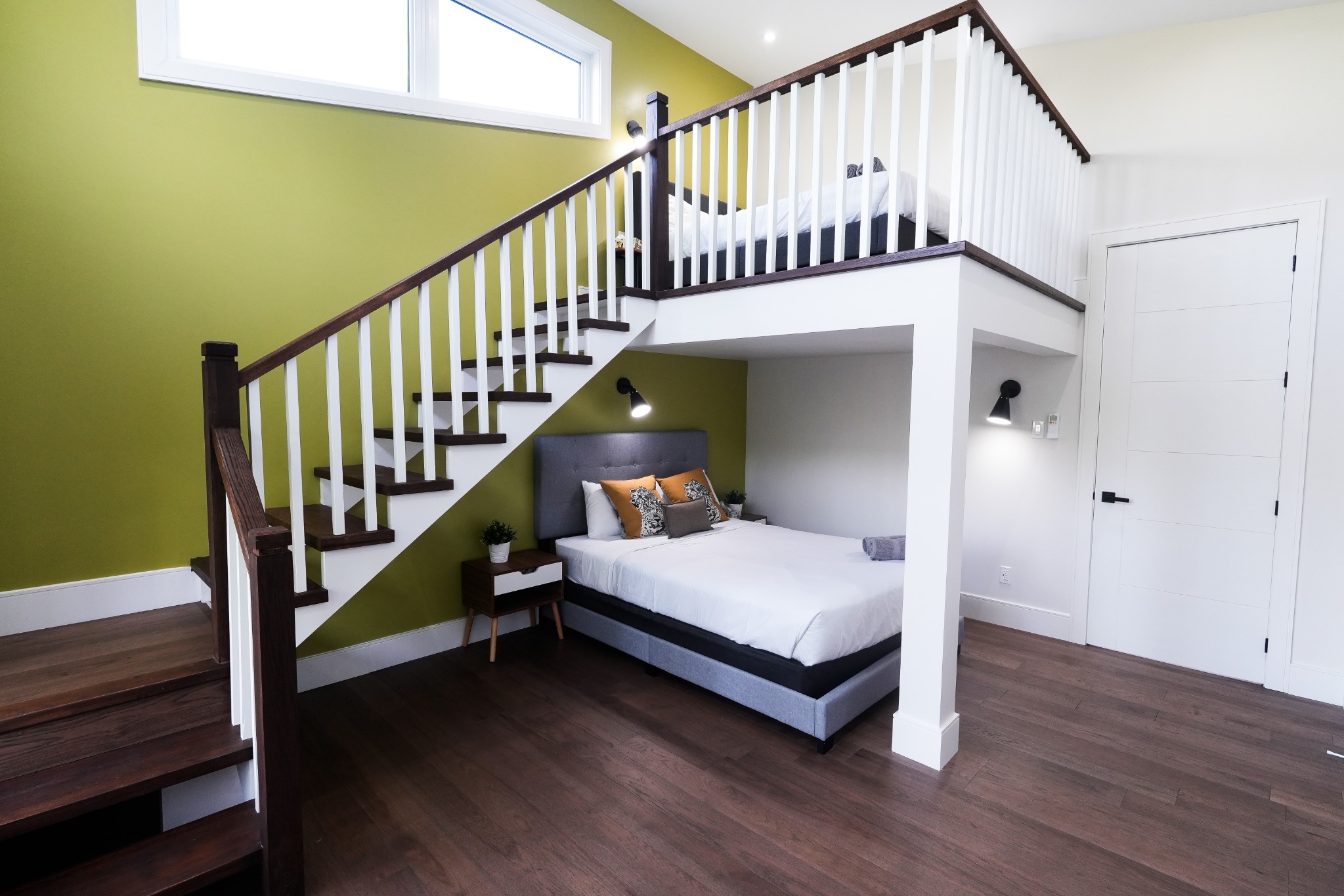 Second bedroom with queen bed and private loft above