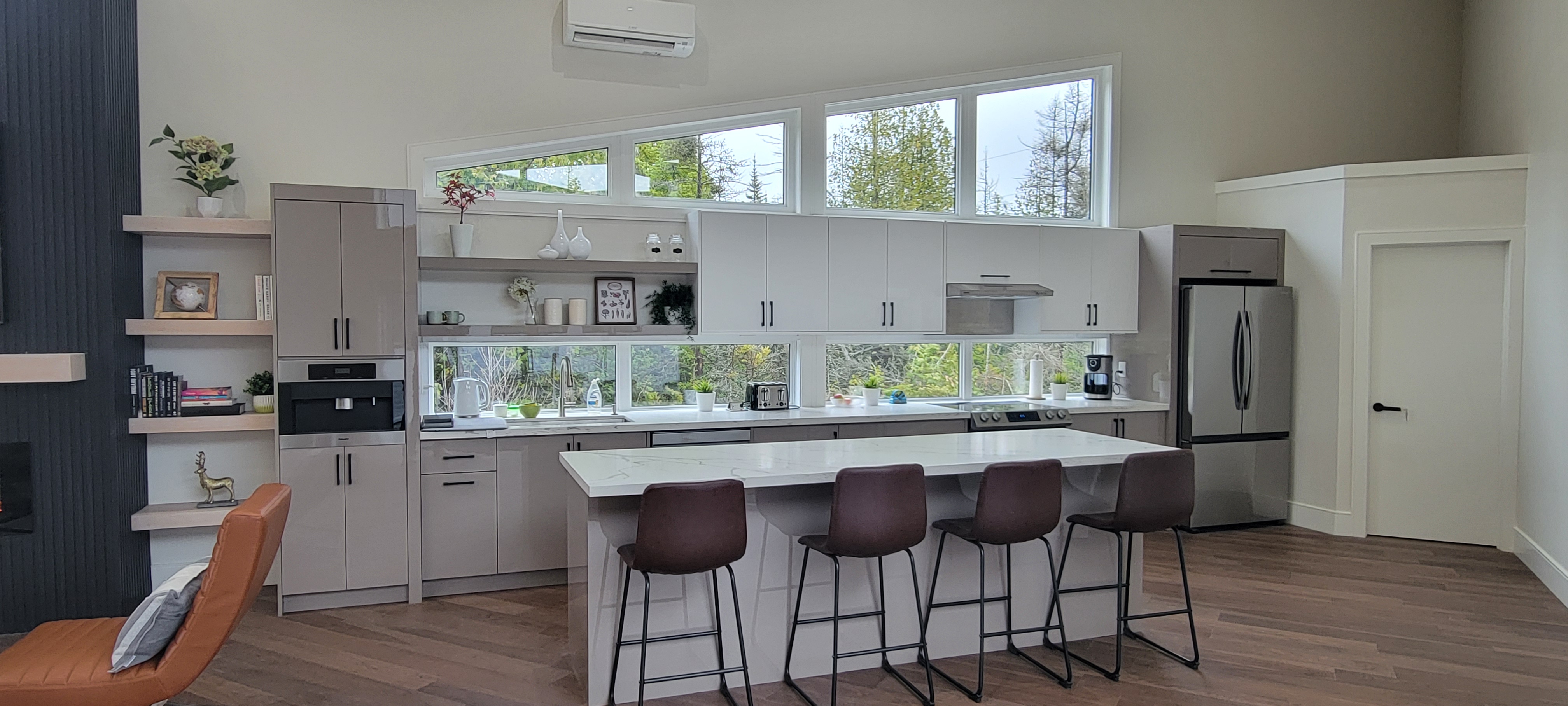 Large white kitchen with island seating